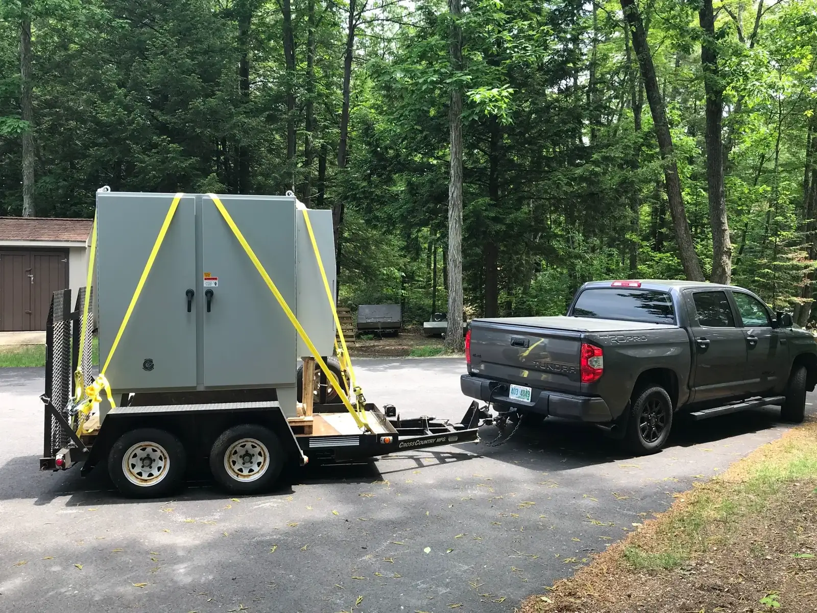 Control panel cabinet loaded on trailer for delivery